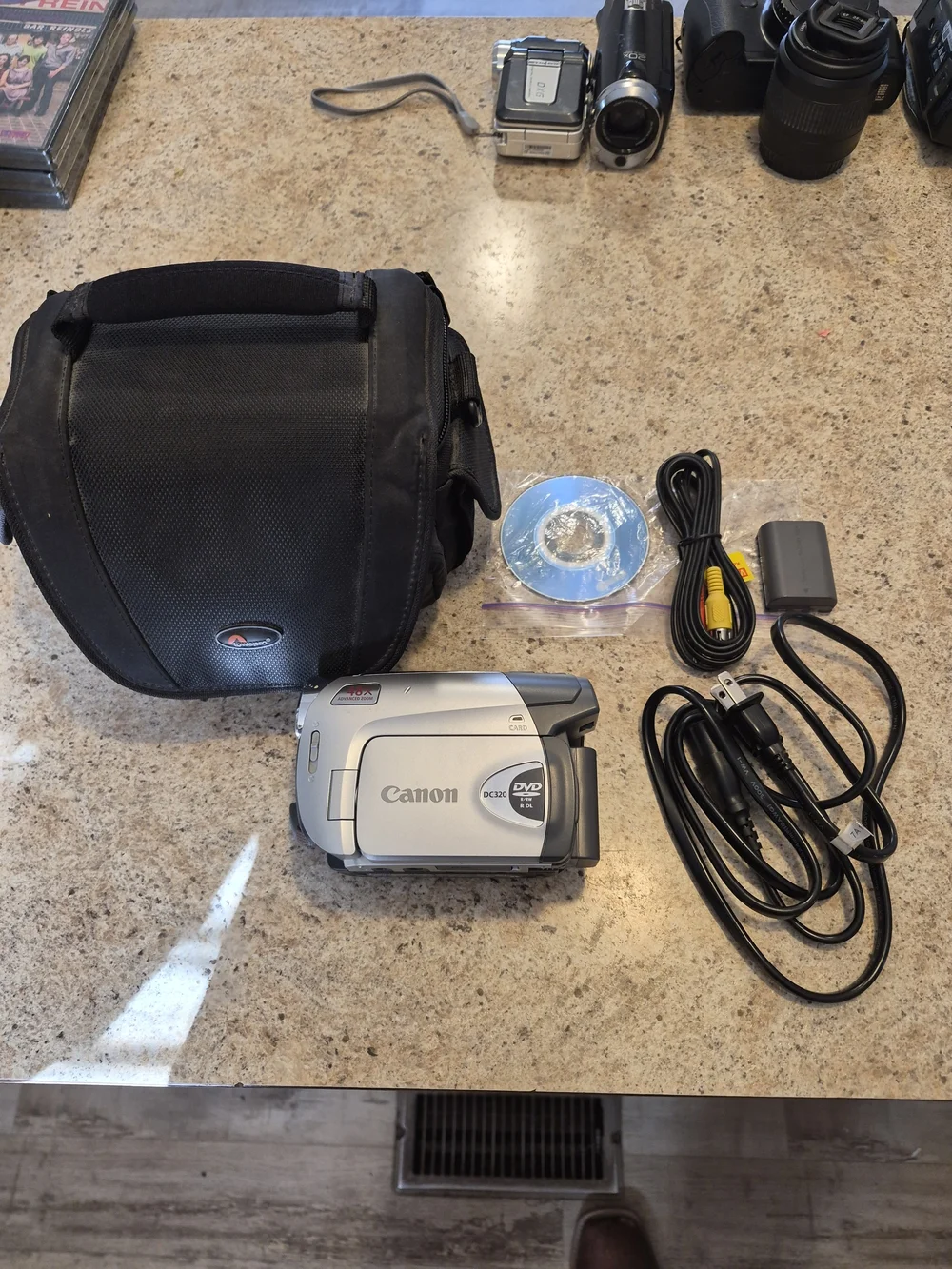 Canon Model # DC-320 Silver DVD Camcorder with Accessories